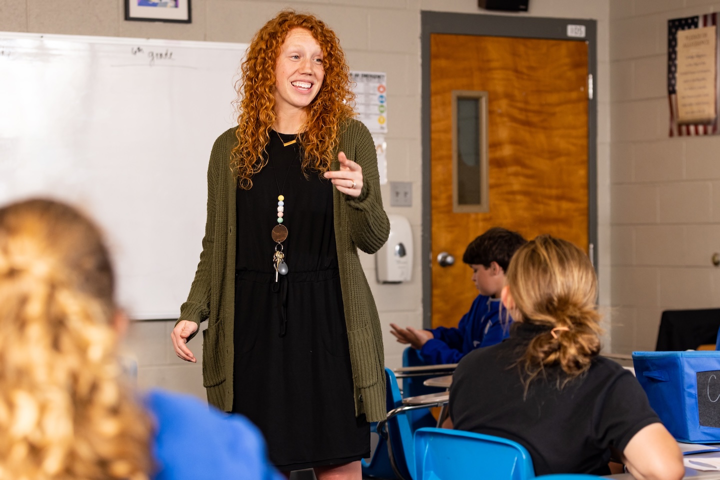 A teacher giving instruction to her class